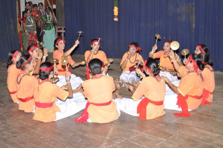 Students performing Kamsale, a folk form of Karnataka