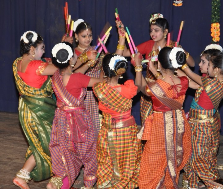 Students performing Kolata, a Karnataka folk dance
