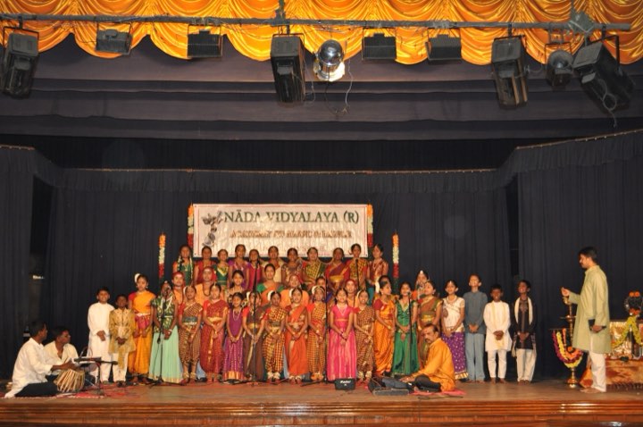 Carnatic music students of Nadavidyalaya on stage