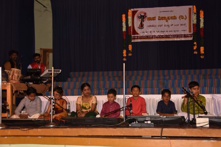 Young students of Nadavidyalaya at their keyboards in concert